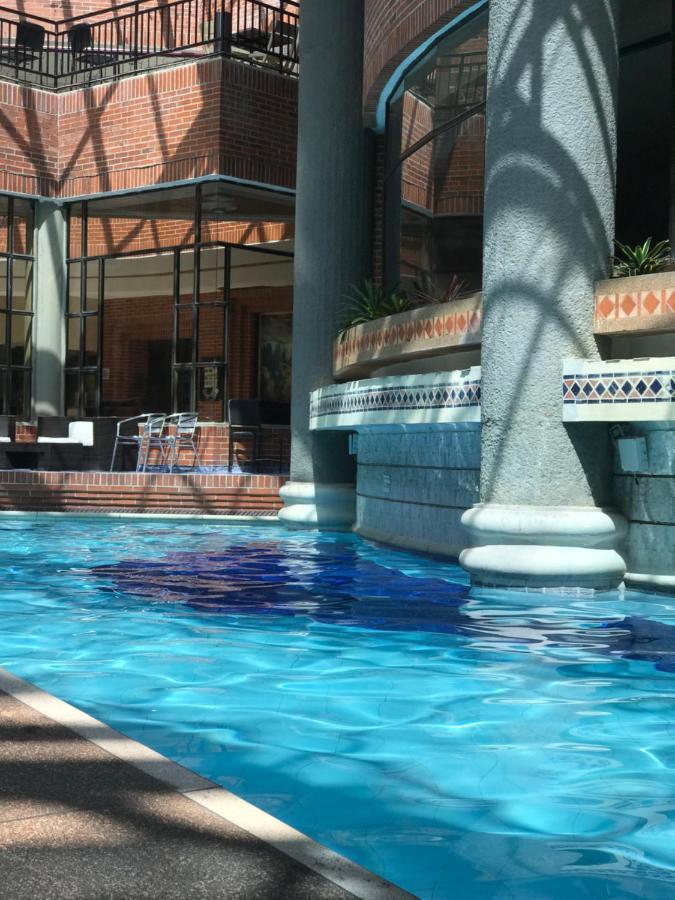 Casa Morales Hotel Internacional Y Centro De Convenciones Ibagué Exteriér fotografie The indoor pool at the hotel
