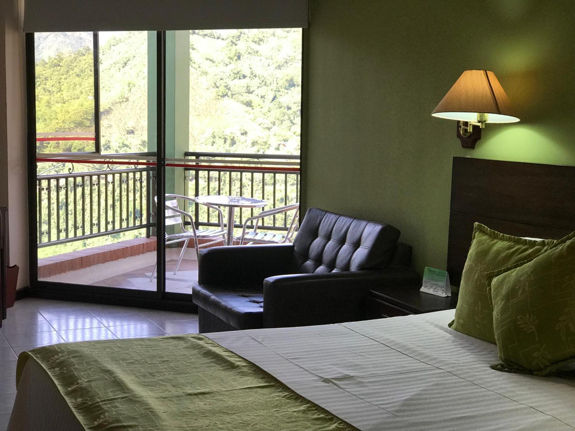 Casa Morales Hotel Internacional Y Centro De Convenciones Ibagué Exteriér fotografie A room at the hotel